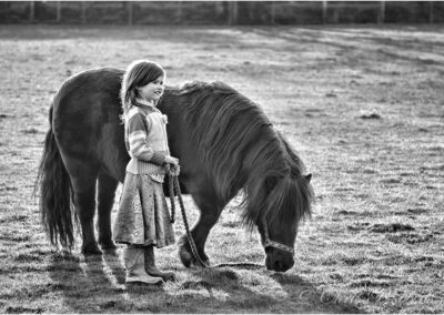 pony, child, childhood, mono, black and white, cute, girl, young, sport, animal, female, outdoor, rider, horseback, lifestyle, people, ride, beautiful, person, attractive, equestrian, activity, rural, hobby, horseback riding, horse riding, riding, ranch, outside, equine, healthy, caucasian,