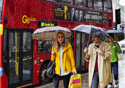 Oxford Street,London,rain,bus,shoppers,umbrella,people,shopping,walking,city,capital city,umbrellas,wet,wet day,London bus,population