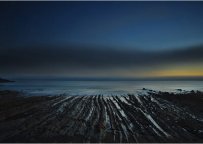 Welcombe Mouth Bay,Devon,coast,erosion,dusk,night,geological,geology,lines,mist,misty,sea mist,mood,moody,mouth,picturesque,rock,rocky,scenery,scenic,scenics,sea,seascape,seascapes,sedimentary,shore,strata,stratified,sunset,uk,view,views,water,atmosphere,atmospheric,evening,travel,holiday,tourism,beauty spot,destination,night photography,stars,blur,blurred,blurry,Britain,British,coast,coastline,drama,dramatic,england,English,eroded,ethereal