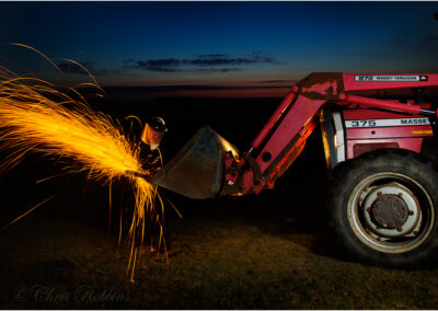 night; shift; working; motion; employee; cold; one; people; work; overworked; tired; workload; workaholic; deadline; overtime; busy; overnight; light; dangerous; safety; tractor; farmer; mechanic; repair; middle-aged; rural place; lifestyle; countryside; agriculture; farming; farm; agricultural; machinery; caucasian; equipment; grinder; equipment; tool; grinding; steel